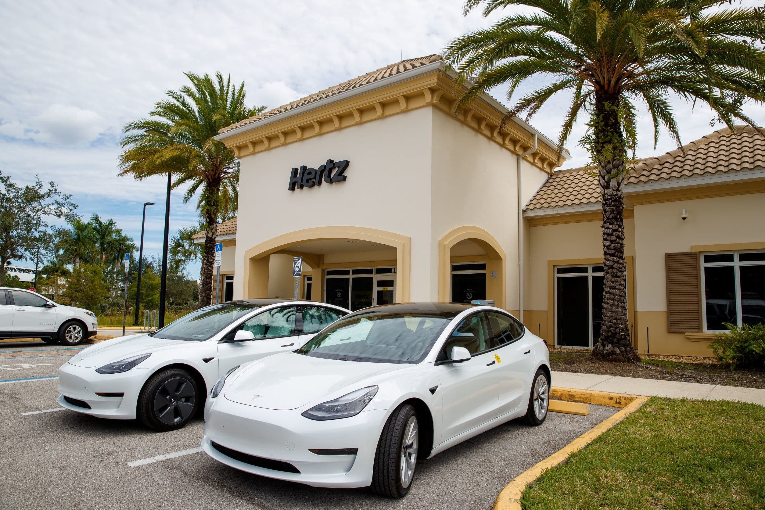Hertz airport rental location storefront